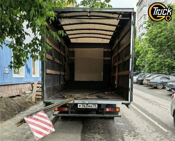 Перевозка/доставка 6-метровой арматуры на Газели с дорожным знаком в Томске